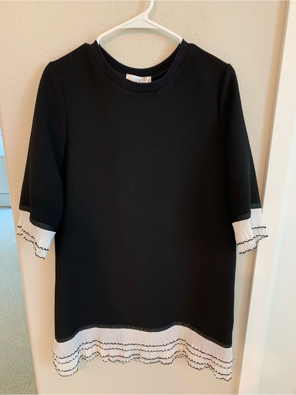 Women Black Mini Dress with white ruffled trim Size 6